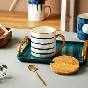 Japanese style large ceramic mug with blue stripes, gold handle, lid and spoon set
