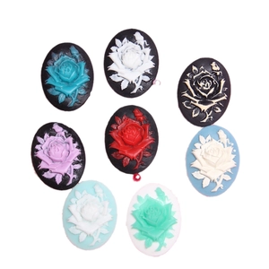 Set of eight colorful resin rose relief cameos in oval shapes for DIY jewelry making