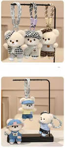 Detailed set of cute plush bear charms with woven ropes and various fabric outfits