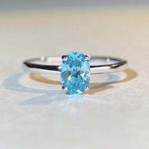 Elegant S925 sterling silver ring featuring a large light blue oval cut gemstone