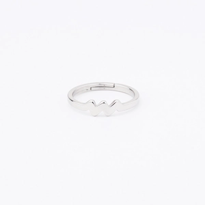 Detailed view of the adjustable silver stainless steel heartbeat wave ring with mirror finish