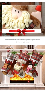 Close-up of Christmas stocking details with plaid fabric and plush character appliques