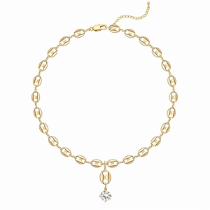 Macro detail of French style gold pig nose chain necklace with sparkling zircon pendant