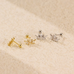 Sparkling S925 silver crown stud earrings with marquise cubic zirconia on stone surface