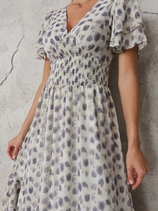 Vintage V-neck floral maxi dress with ruffle sleeves and smocked high waist in purple