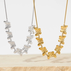 Elegant stainless steel bow pendant layered necklaces in gold and silver finishes