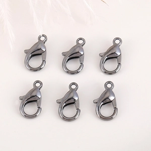 Gunmetal alloy lobster clasps for DIY jewelry making displayed on a minimal background