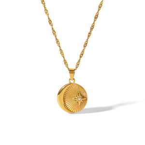 Macro view of 18K gold plated celestial necklace with crescent moon and star pendant