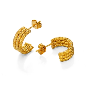 Golden C-shape hoop earrings with textured diamond-cut surface and stud backings