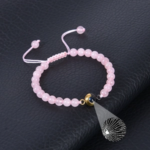 Detail view of pink Amazonite bead projection bracelet with 100 languages I Love You