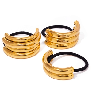 Three-piece set of black elastic hair ties with polished gold metal rings for women