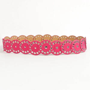 Pink leather belt detail with round segments and metallic silver rivet eyelets decoration