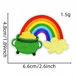 Detailed close-up of rainbow and gold pot embroidered patch with 4.8cm x 6.6cm dimensions