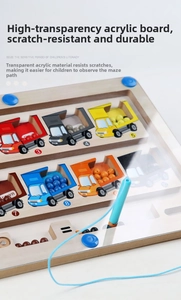 Detail of wooden magnetic color and number maze toy with acrylic cover and beads