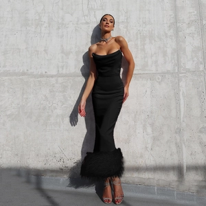 Slim fit black tube top evening dress with elegant faux feather hem and satin finish