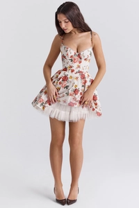 Detailed view of the layered tulle hem on this floral print backless summer dress