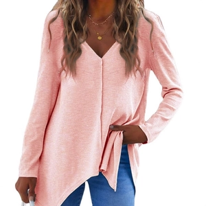 Pink V-neck knit sweater for women featuring a long sleeve design and asymmetric hemline