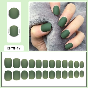 Detail view of DFYM-19 matte dark green short square press-on nails with various sizes