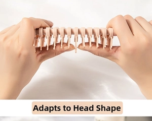 Flexible pink hairbrush design showing how it adapts to the head shape with massage bristles