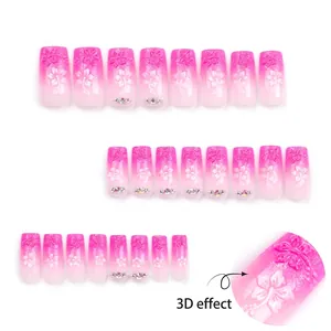 Pink gradient press-on nails with 3D floral petals and rhinestones in long square shape