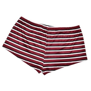 Detail of red and black striped slim fit shorts with elastic waist for casual style