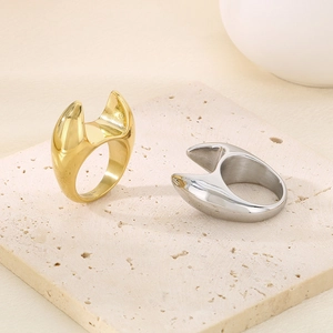 Minimalist irregular geometric chunky rings in gold and silver finish on stone
