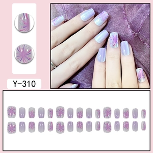 Purple cat eye press-on nails with 24-piece glitter firework design and Y-310 model
