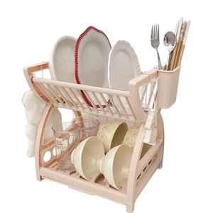 Pink two-tier plastic dish drying rack for kitchen organization with hooks and cutlery holder