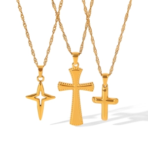 Three assorted 18k gold plated stainless steel cross pendants on delicate link chains