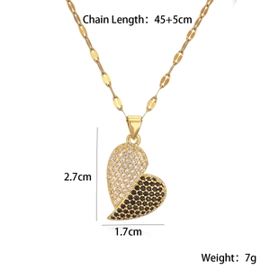 Detail of 18K gold plated heart necklace with black and white zircon stone pendants