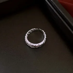Silver twisted zircon open ring with irregular feather texture and adjustable band