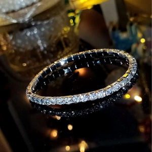 Single row 2.0mm crystal tennis bracelet for brides with silver finish and elastic band