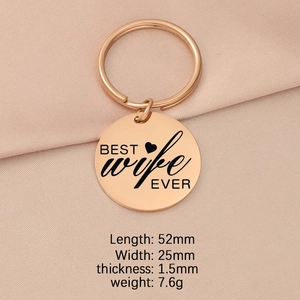 Polished rose gold round keychain pendant with Best Wife Ever text and heart charm