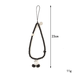 Beaded phone lanyard with black beads and silver cherry pendant, 23cm length detail