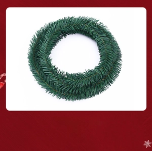 Close-up of 5.5m dense green Christmas tinsel garland for holiday festive decoration