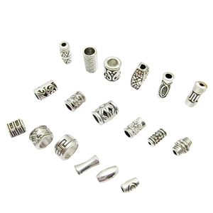 Vintage Tibetan silver barrel beads with embossed tribal patterns for DIY jewelry making