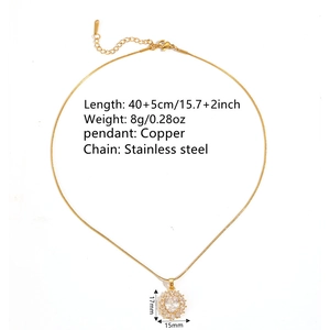 Gold oval pendant necklace with sparkling stones on stainless steel snake chain