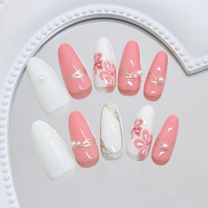 Elegant 3D pearl flower press-on nails with pink hand-painted floral designs and gold wavy lines