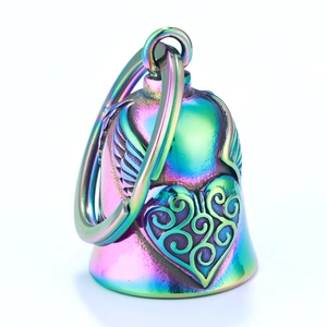 Macro shot of colorful stainless steel motorcycle guardian bell with heart and angel wings