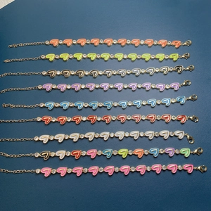 Zircon enamel heart bracelets in nine colors with gold finish and lobster clasps