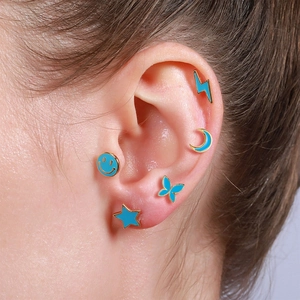 Five-piece set of gold-plated green enamel stud earrings with star, moon and butterfly shapes