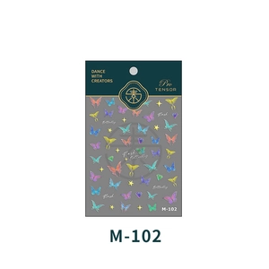 Macro shot of M-102 nail art stickers featuring colorful aurora butterflies and star patterns