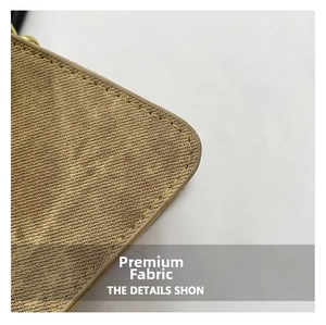 Close-up of golden brown diagonal woven texture and fine stitching on stylish bag
