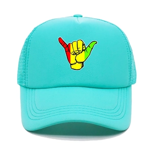 Detail of light blue trucker hat featuring a colorful Shaka hand gesture print and mesh back