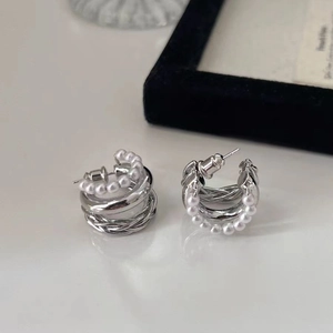 French vintage multilayer pearl knot earrings in silver with a triple wrap structure