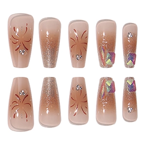 Sparkling champagne gradient press-on nails with fireworks patterns and square rhinestones