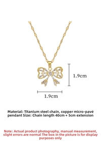 Close-up of titanium steel butterfly pendant with zircon inlay and 40cm plus 5cm chain