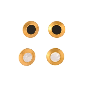 Detail of round gold titanium earrings with black resin and white mother-of-pearl inlays