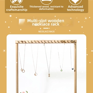 Detail of wooden necklace display stand with multiple metal hooks for jewelry organizing