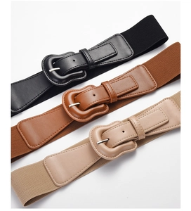 Detailed trio of elastic wide waist belts in black, brown, and beige with large PU buckles